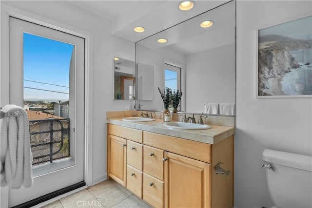715 3rd St, Hermosa Beach, CA 90254 - full bath featuring tile patterned flooring, double vanity, toilet, and a sink