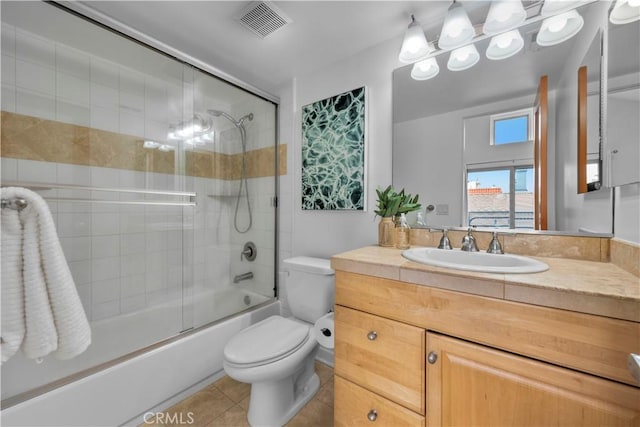 715 3rd St, Hermosa Beach, CA 90254 - full bath with tile patterned floors, toilet, visible vents, combined bath / shower with glass door, and vanity