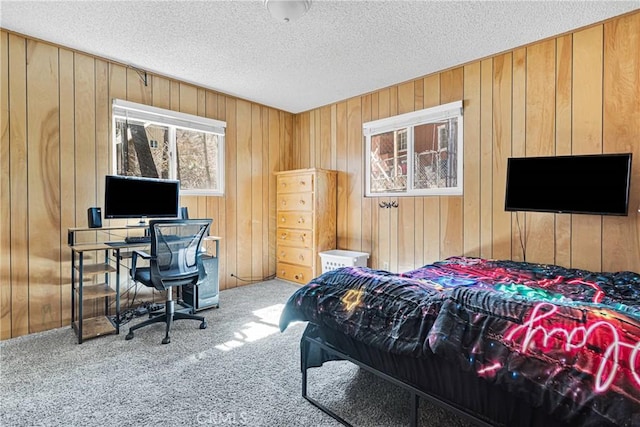 23660 Shady Ln, Crestline, CA 92325 - carpeted bedroom with wood walls and a textured ceiling