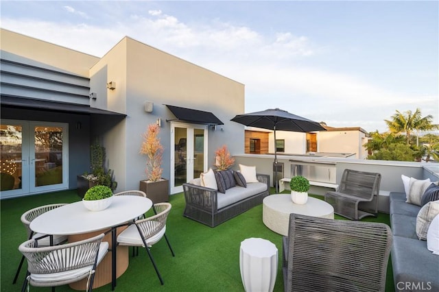 exterior space featuring outdoor lounge area and french doors