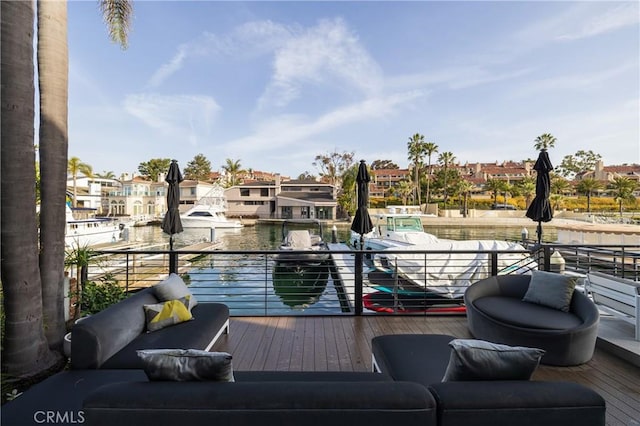 deck featuring outdoor lounge area and a residential view