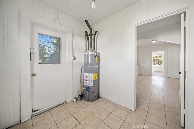 utility room featuring gas water heater