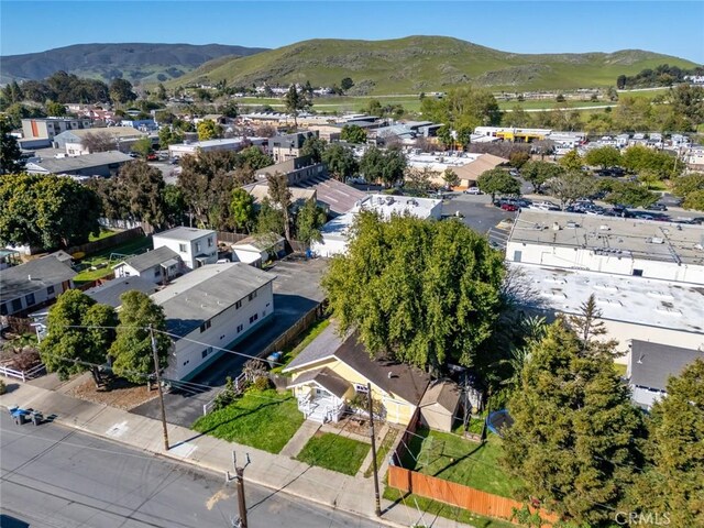 drone / aerial view featuring a mountain view