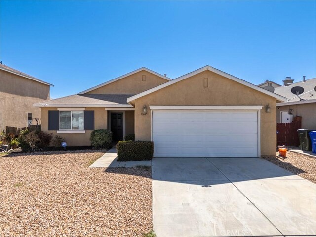 13625 Brynwood St, Victorville, CA 92392 - ranch-style house with driveway, an attached garage, stucco siding, and a shingled roof
