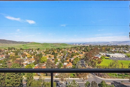 balcony featuring a mountain view