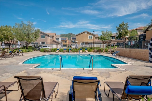 12241 Amaryllis, Yucaipa, CA 92399 - community pool with a residential view and a patio area