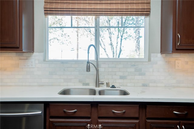 12241 Amaryllis, Yucaipa, CA 92399 - kitchen featuring dishwasher, a sink, light countertops, dark brown cabinets, and backsplash