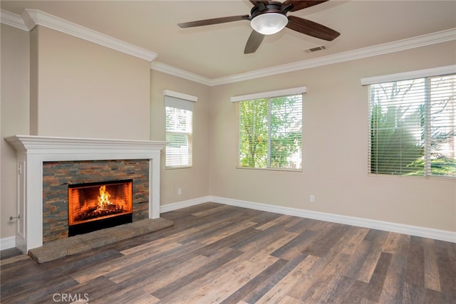 12241 Amaryllis, Yucaipa, CA 92399 - unfurnished living room with wood finished floors, a stone fireplace, ornamental molding, baseboards, and ceiling fan