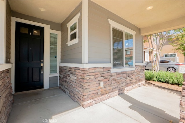 12241 Amaryllis, Yucaipa, CA 92399 - entrance to property with stone siding and a porch