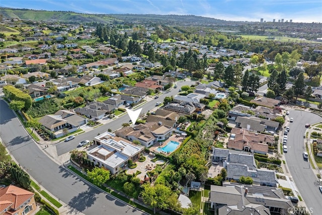 aerial view of property's location featuring nearby suburban area