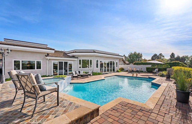 view of swimming pool with a patio and outdoor lounge area