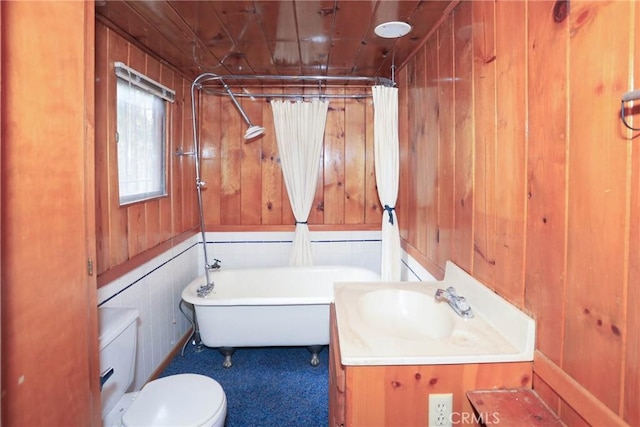 full bath with curtained shower, toilet, wood walls, and a bath