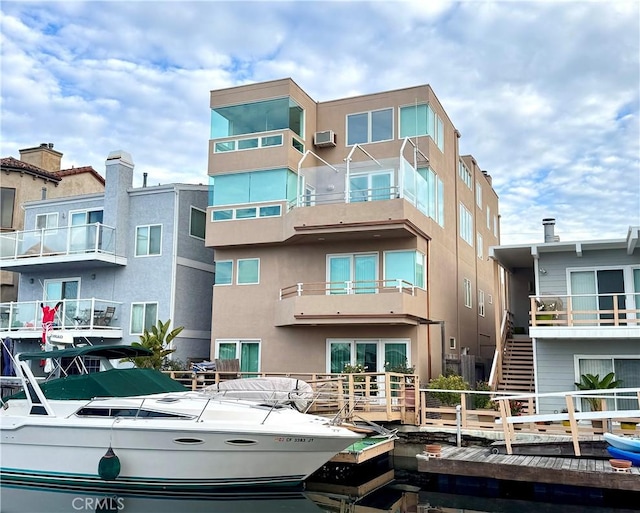 16745 Bayview Dr Unit B, Sunset Beach, CA 90742 - view of apartment building / complex featuring a wall unit AC