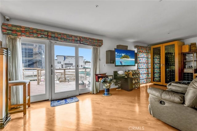 16745 Bayview Dr Unit B, Sunset Beach, CA 90742 - living room with wood finished floors
