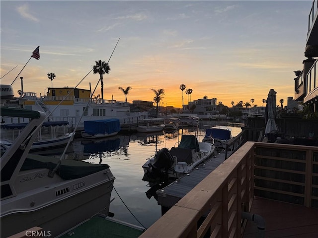 16745 Bayview Dr Unit B, Sunset Beach, CA 90742 - wooden deck with a dock and a water view