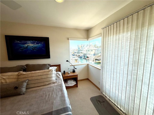 16745 Bayview Dr Unit B, Sunset Beach, CA 90742 - carpeted bedroom featuring baseboards
