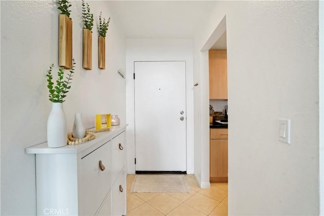 hallway with light tile patterned flooring