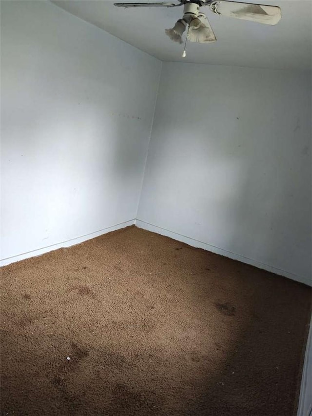 107 N Rine St, Alturas, CA 96101 - empty room with carpet floors, a ceiling fan, and baseboards