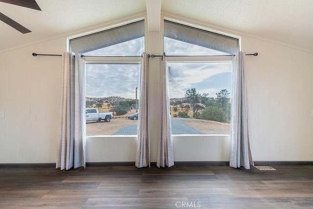 27062 Rd 400, Madera, CA 93636 - interior space featuring a textured ceiling, vaulted ceiling, and wood finished floors