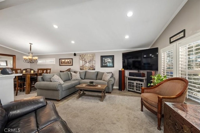 living area with vaulted ceiling, crown molding, a notable chandelier, light wood finished floors, and recessed lighting