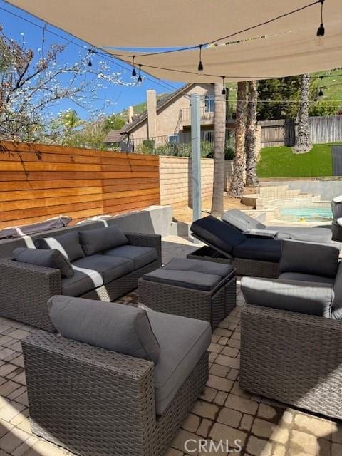 23010 Finch St, Grand Terrace, CA 92313 - fenced backyard with an outdoor hangout area and a patio area