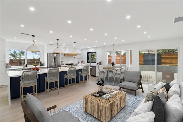 23010 Finch St, Grand Terrace, CA 92313 - living area with recessed lighting, plenty of natural light, and light wood-style flooring