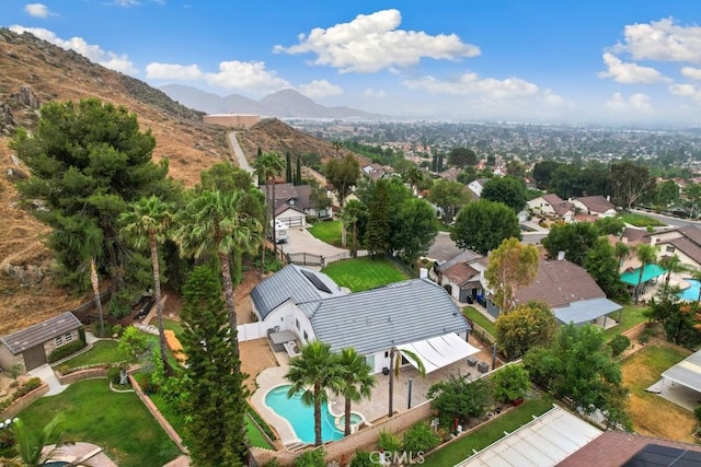 23010 Finch St, Grand Terrace, CA 92313 - aerial view of property and surrounding area with nearby suburban area and a mountain backdrop