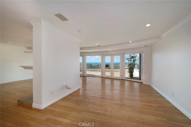 33571 Binnacle Dr, Dana Point, CA 92629 - spare room with ornamental molding, light wood-style floors, baseboards, and recessed lighting