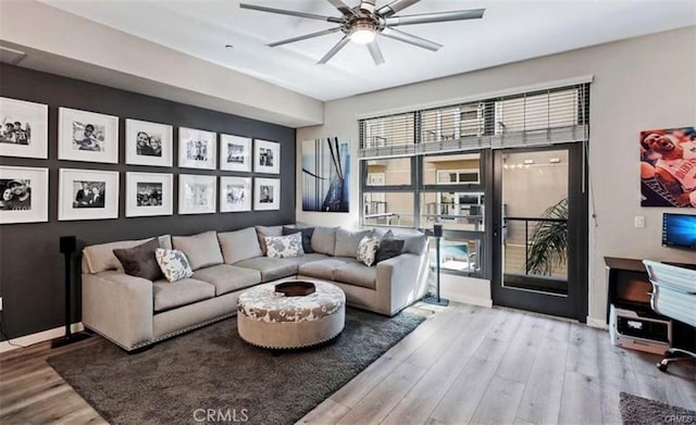 133 The Promenade N Unit 317, Long Beach, CA 90802 - living area with wood finished floors, a ceiling fan, and baseboards