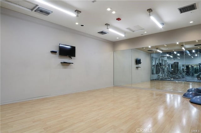 133 The Promenade N Unit 317, Long Beach, CA 90802 - workout area featuring wood finished floors, recessed lighting, and baseboards