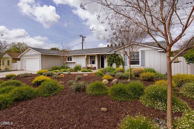 1009 Grandview Ave, Ojai, CA 93023 - ranch-style house with a garage, driveway, board and batten siding, and a shingled roof