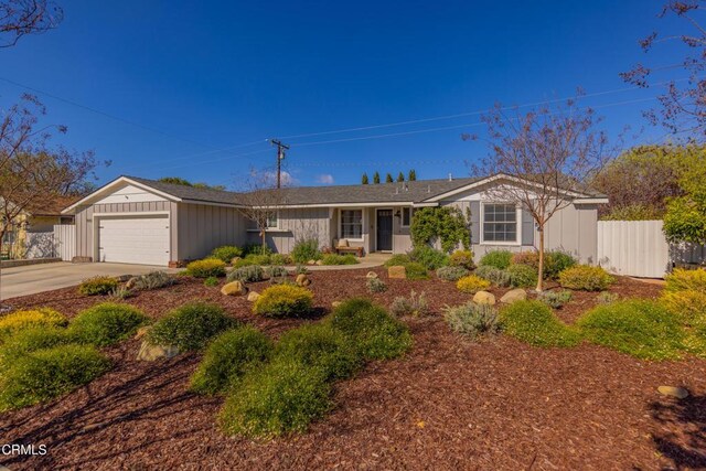 1009 Grandview Ave, Ojai, CA 93023 - ranch-style home with a garage, driveway, and board and batten siding
