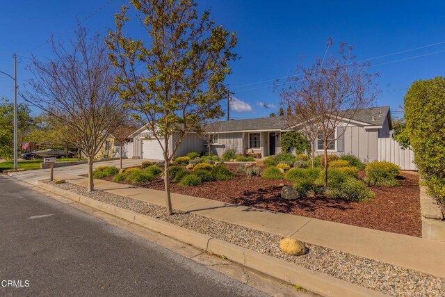 1009 Grandview Ave, Ojai, CA 93023 - ranch-style home with an attached garage and driveway