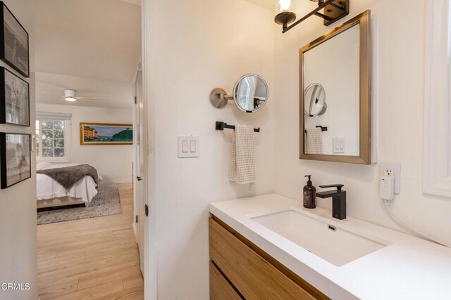 1009 Grandview Ave, Ojai, CA 93023 - ensuite bathroom with vanity, wood finished floors, and ceiling fan
