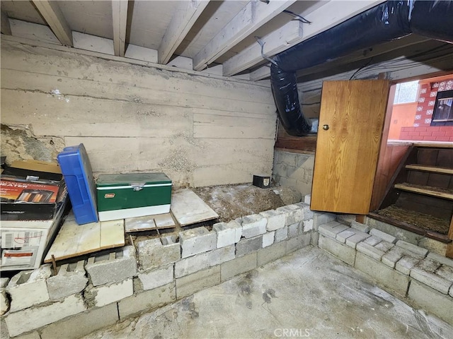 details with unfinished concrete flooring