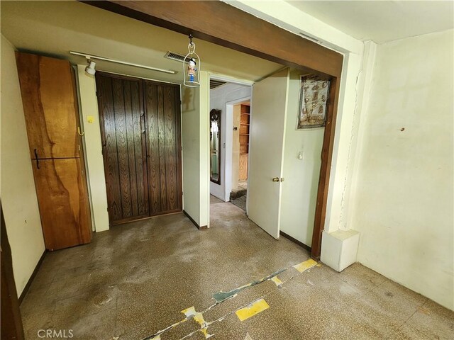 unfurnished bedroom featuring a closet