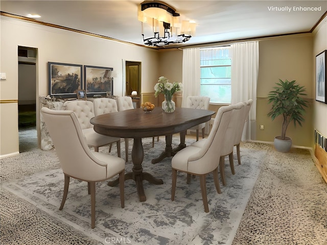 dining area featuring a chandelier, baseboards, and ornamental molding