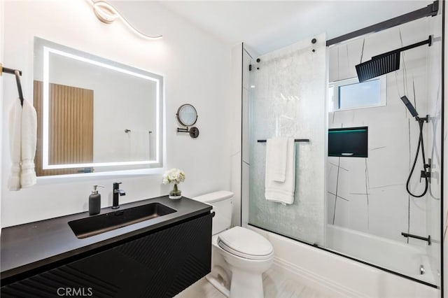 5591 Heil Ave, Huntington Beach, CA 92649 - bathroom with toilet, combined bath / shower with glass door, and vanity