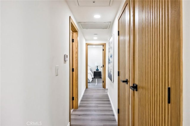 5591 Heil Ave, Huntington Beach, CA 92649 - hall featuring baseboards and wood finished floors