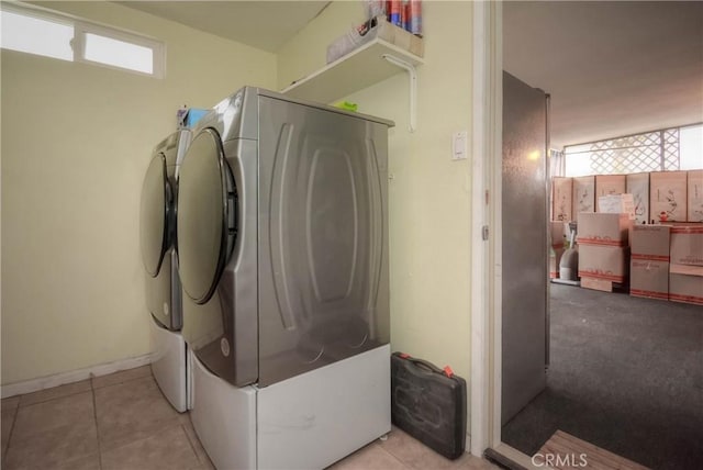 29093 Carmel Rd, Menifee, CA 92586 - laundry room featuring independent washer and dryer and tile patterned floors