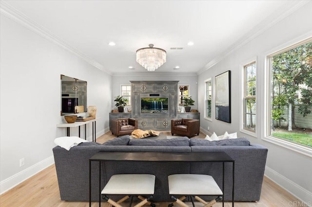 living room with visible vents, recessed lighting, a notable chandelier, and light wood finished floors