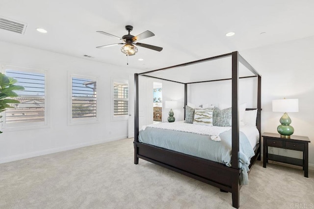 carpeted bedroom featuring baseboards, a ceiling fan, visible vents, and recessed lighting