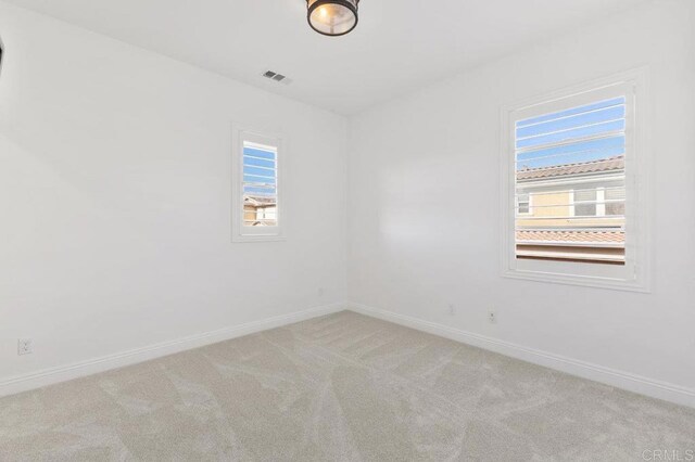715 Blossom Rd, Encinitas, CA 92024 - unfurnished room featuring light carpet and baseboards