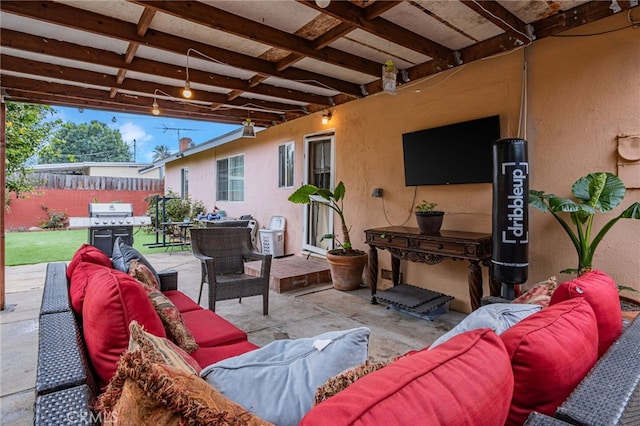 view of patio / terrace featuring outdoor lounge area, fence, outdoor dining area, and area for grilling