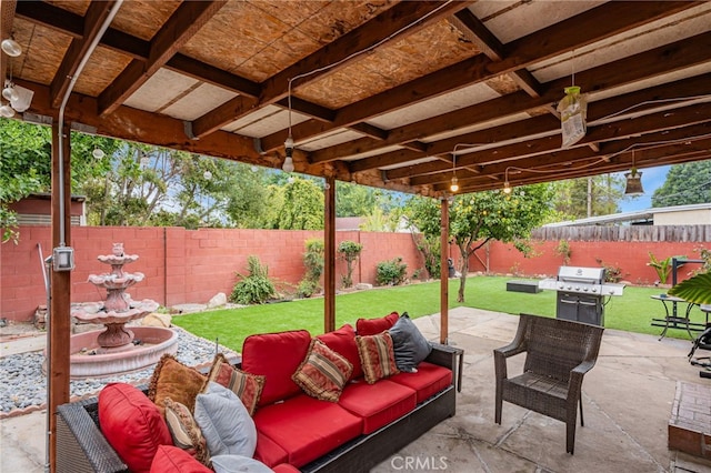 view of patio / terrace featuring area for grilling, a fenced backyard, and outdoor lounge area