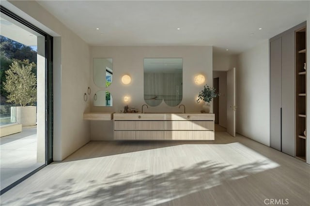 17177 Adlon Rd, Encino, CA 91436 - bathroom featuring double vanity and plenty of natural light