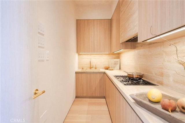 17177 Adlon Rd, Encino, CA 91436 - kitchen featuring light countertops, light brown cabinetry, modern cabinets, and tasteful backsplash