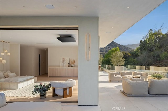 17177 Adlon Rd, Encino, CA 91436 - view of patio with an outdoor living space and a mountain view