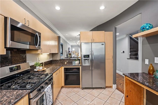 5350 Sepulveda Blvd Unit 15, Sherman Oaks, CA 91411 - kitchen featuring appliances with stainless steel finishes, recessed lighting, dark stone counters, light brown cabinets, and light tile patterned floors