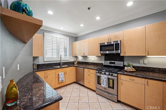 5350 Sepulveda Blvd Unit 15, Sherman Oaks, CA 91411 - kitchen featuring stainless steel appliances, a sink, crown molding, light brown cabinets, and dark stone countertops